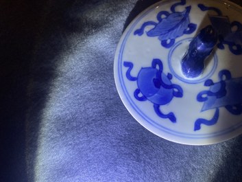 A Chinese blue and white 'antiquities' teapot and cover, Kangxi